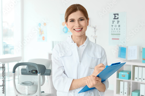 Portrait of female ophthalmologist in clinic photo