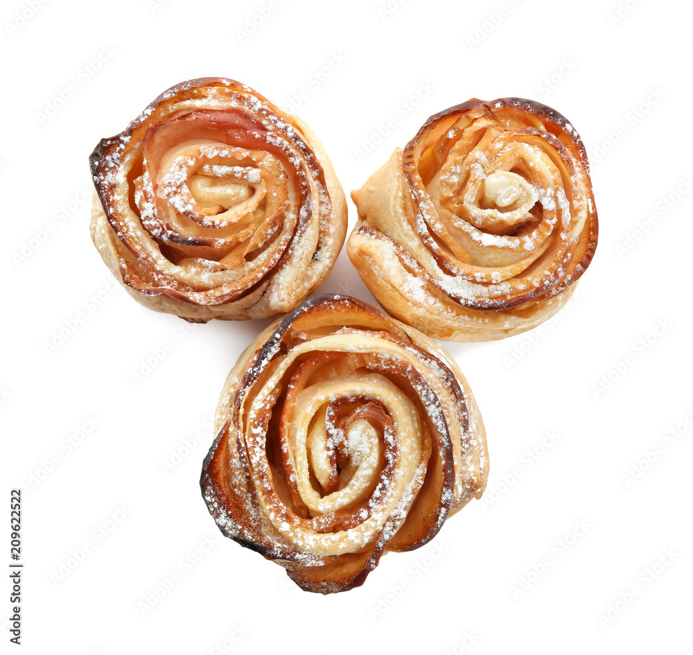 Tasty apple roses from puff pastry on white background Tasty apple roses from puff pastry on white background
