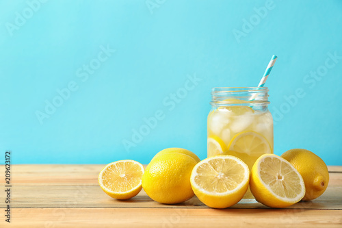Natural lemonade in mason jar on wooden table