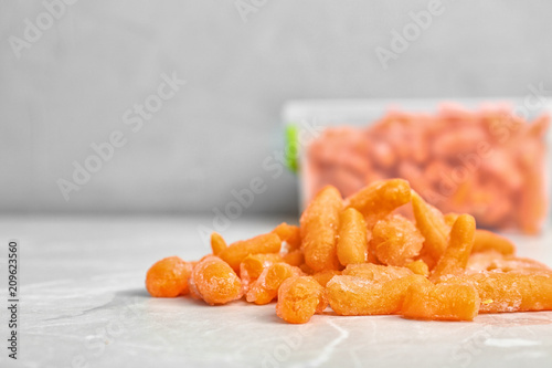 Frozen carrots on table. Vegetable preservation