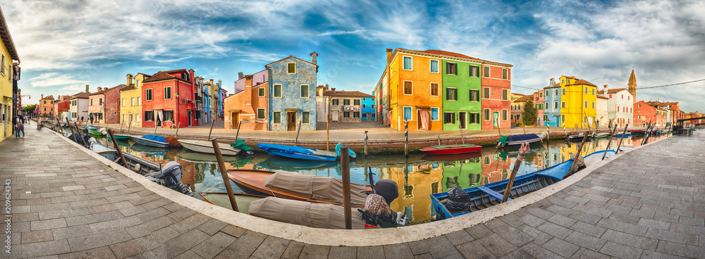 Colorful houses along the canal, island of Burano, Venice, Italy
