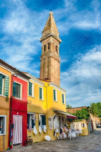 The leaning belltower of St Martin Church, Burano, Venice, Italy