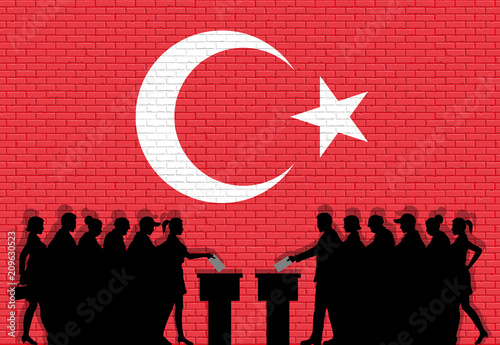 Turkish voters crowd silhouette in election with Turkey flag graffiti in front of brick wall