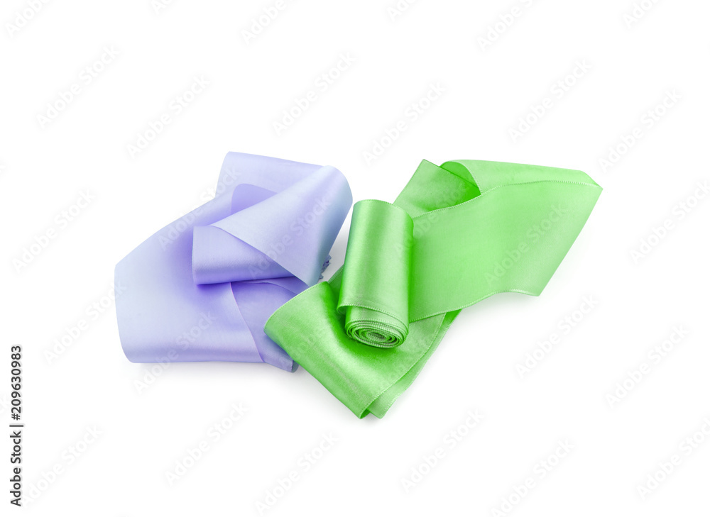 Two rolls of Satin ribbon of lilac and green color isolated on white background Two rolls of Satin ribbon of lilac and green color isolated on white background