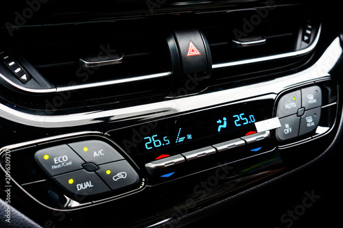Close up car ventilation system and air conditioning - details and controls of modern car.