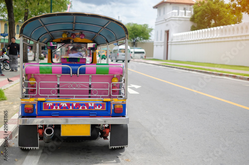 Tuk Tuk (Thai traditional taxi car) parking for wait a tourist passenger, sightseeing in Bangkok, Thailand