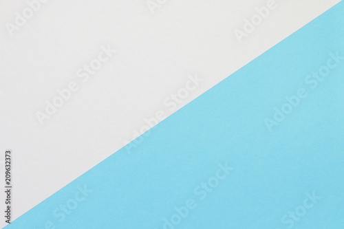 Two color paper with blue and white Overlap on the floor And split half of the image. background