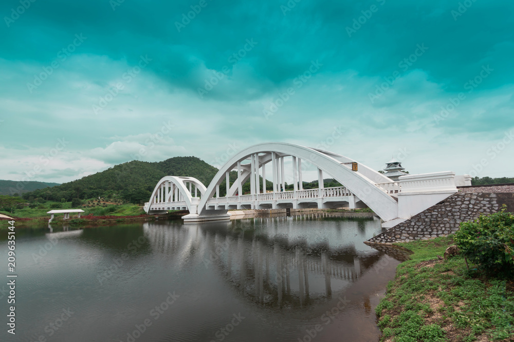 white bridge with beautiful mountain view
