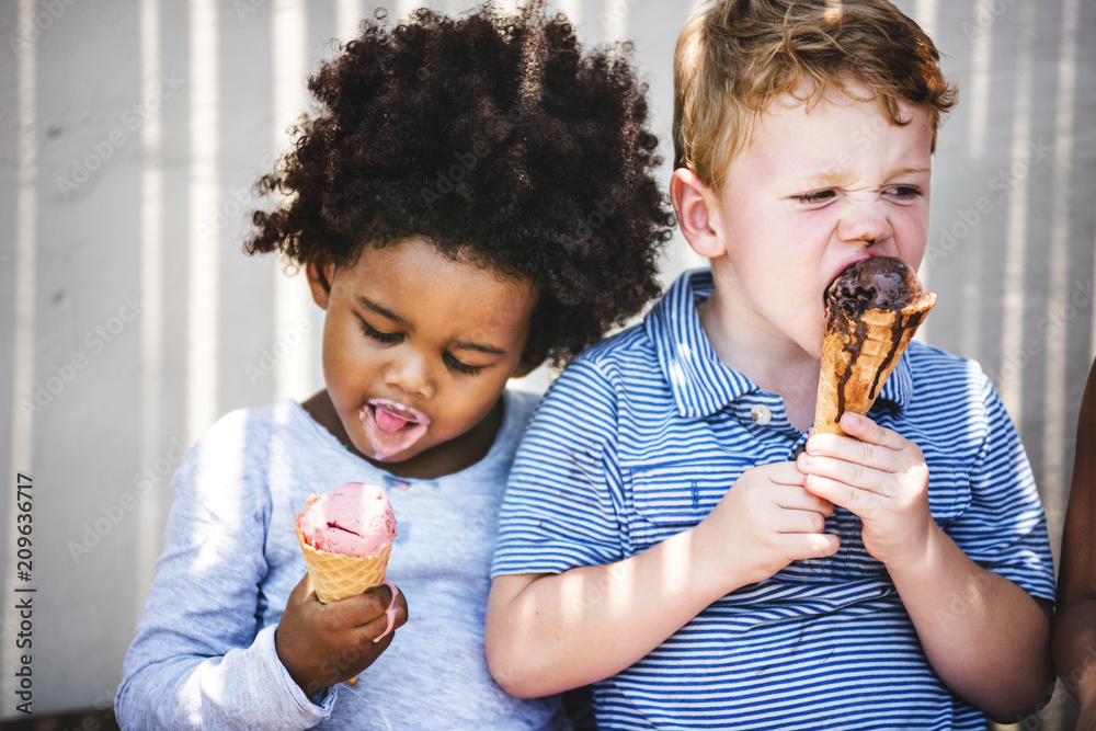 Little kids eating yummy ice cream - obrazy, fototapety, plakaty 