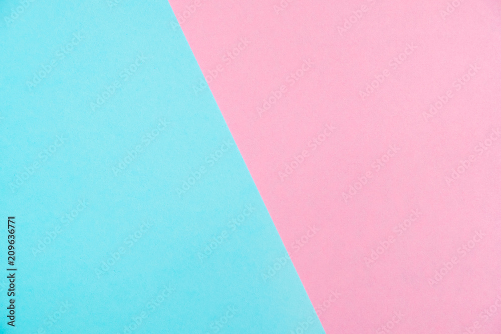 Pastel colored paper flat lay top view, background texture, pink and blue.