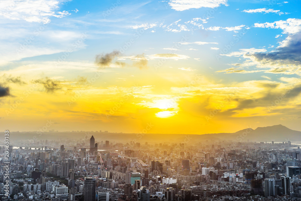 Asia Business concept for real estate and corporate construction - panoramic urban city skyline aerial view under twilight sky and golden sun in Taipei, Taiwan