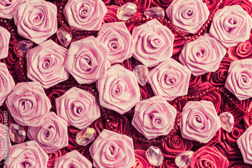 Wedding background with red and light pink silky roses  decoration of the wedding party  delicate bride and bridesmaids texture