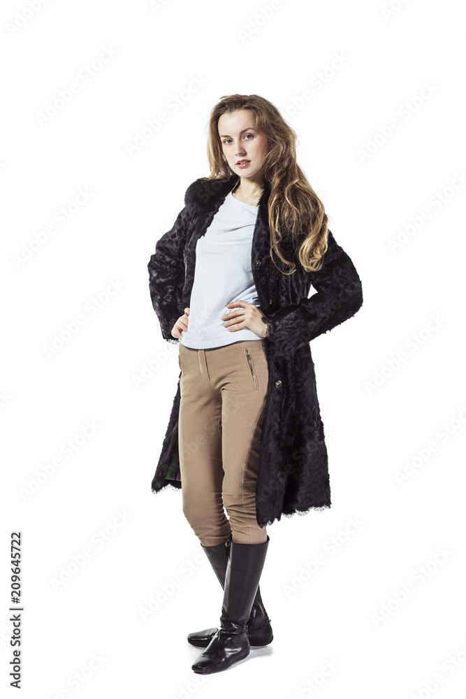 portrait of young business woman in a black coat on a white background portrait of young business woman in a black coat on a white background