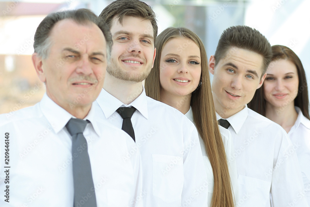 group of young business people standing in a row. group of young business people standing in a row.