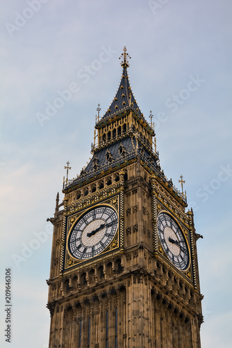 A view of the famous London neo-gothic landmark, the Clock Tower, or Elizabeth Tower, more widely known as Big Ben, against a blue and cloudy sky.