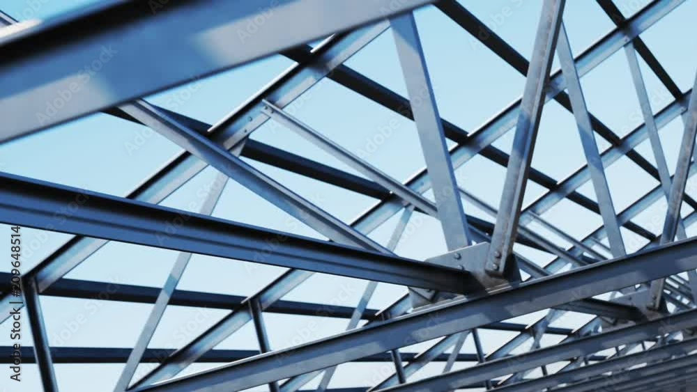 Seamless looping shot with camera moving along the unfinished steel roof