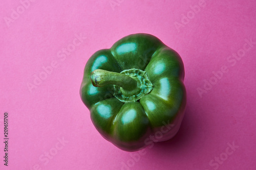 Organic green Bellpepper isolated on pink background