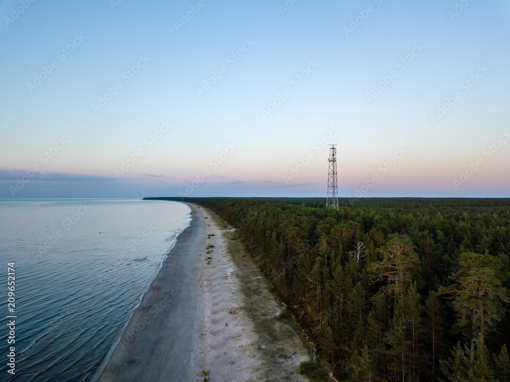 drone image. aerial view of red sunset in the sea. shore line