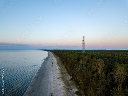 drone image. aerial view of red sunset in the sea. shore line