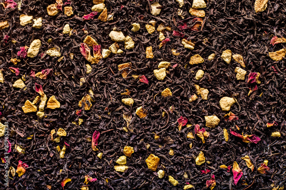 Citrus tea. The orange flavor. Tea with lemon and orange. Assorted flavors. Dried blue cornflower and orange slices. Scattered welding Citrus tea. The orange flavor. Tea with lemon and orange. Assorted flavors. Dried blue cornflower and orange slices. Scattered welding
