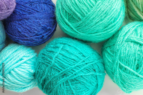 Colorful knitting yarn on white background, closeup