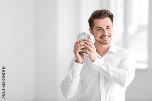 Young businessman holding g...