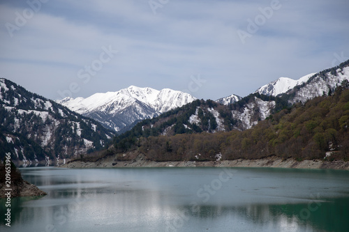 Scenery of lake and mountains from Kurobe Dam in Tateyama Kurobe Alpine Route  Japan