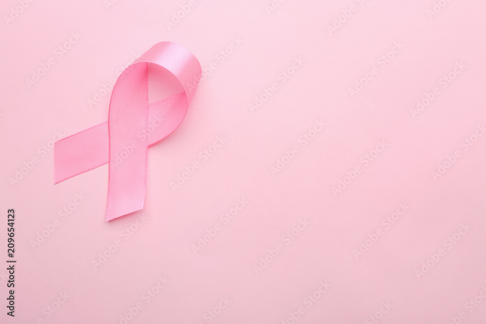 Pink ribbon on color background. Breast cancer concept Pink ribbon on color background. Breast cancer concept