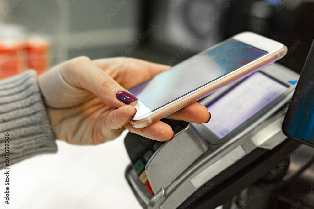 Fototapeta premium NFC - Near field communication, mobile payment
