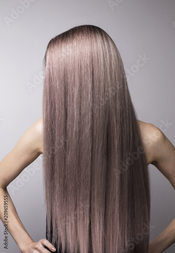 Anonymous long straight healthy cold blonde purple hair.
