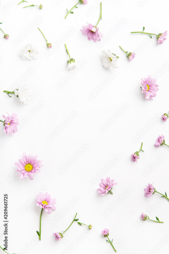Floral pattern arranged on white background with empty space for text framed at the center