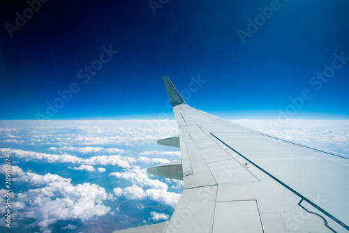 Wing of an airplane.  Traveling concept