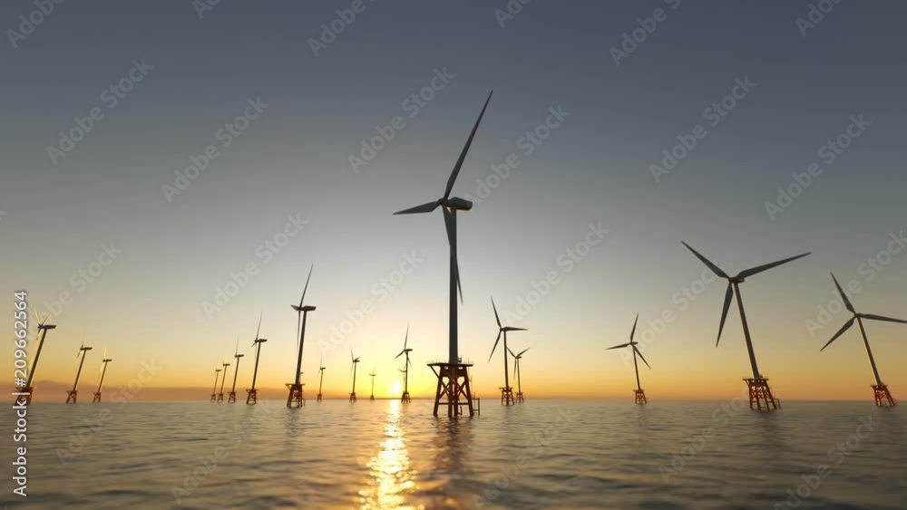 Offshore wind turbines spinning around at the sun setting marine background.