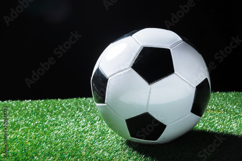 Closeup of ball on the green grass.