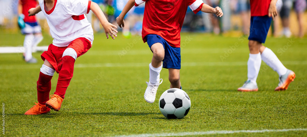 Boys Kicking Soccer Match on Grass. Youth Football Game. Children Sport Competition. Kids Playing Outdoor