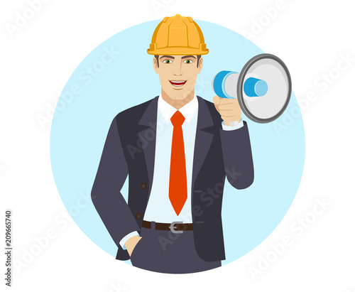 Businessman in construction helmet with loudspeaker and with hand in pocket