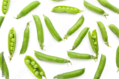 Pods with fresh green peas on white background