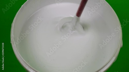 Wallpaper Mural mixing in a bucket of water-based paint Torontodigital.ca