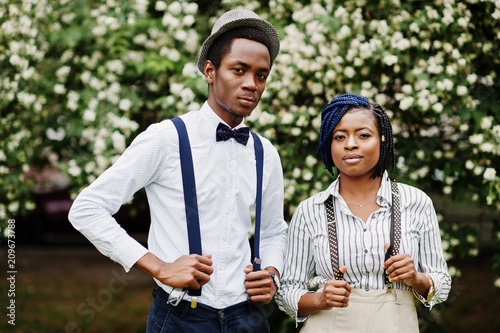Stylish african american business couple posed outdoor.