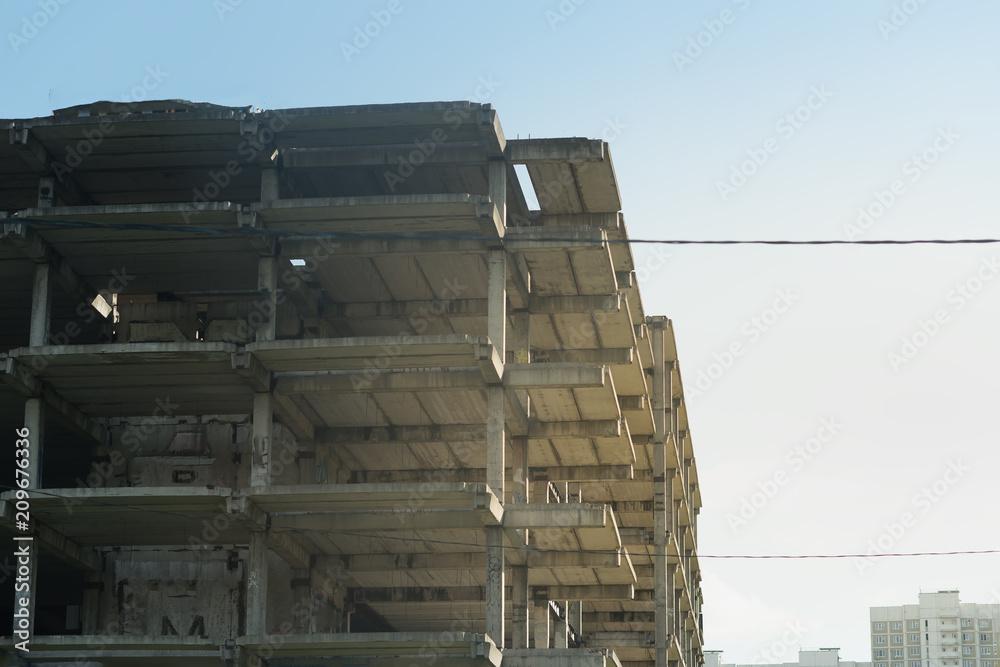 Concrete Building facade with lines and vertical features Concrete Building facade with lines and vertical features