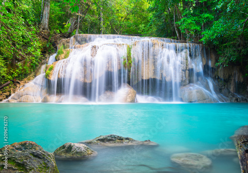 Erawan waterfall in tropical forest in Thailand