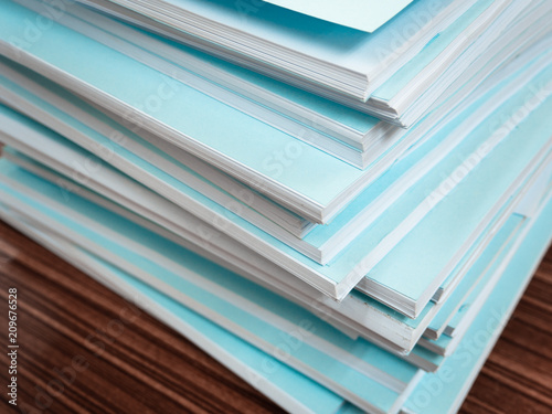 Wallpaper Mural Documents paper stack messy on the desk related to business functions. With selective focus Torontodigital.ca