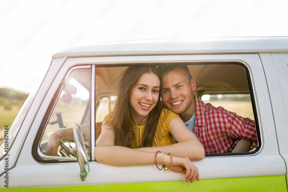 Young couple out on a road trip
