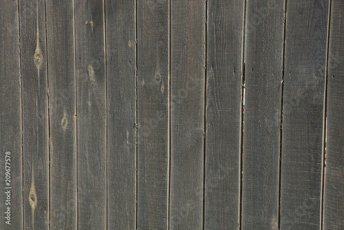 black wooden texture of the boards on the fence