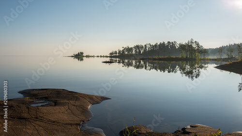 Φωτογραφία Not an irascible smooth surface of the lake in the morning
