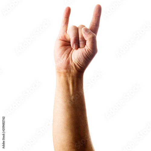 Obraz na płótnie Adult male hand showing rock gesture isolated on white w salonie