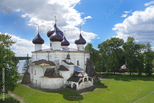 View of ancient Christmas cathedral with counterfort Kargopol town,  Russia photo