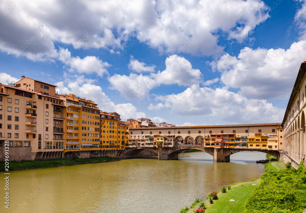 Florence cityscape with Ponte Vecchio Old Bridge over Arno River Tuscany Italy