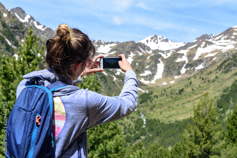 Woman take a picture in Andorra.