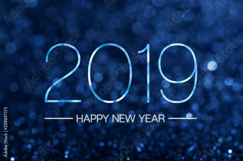 Happy new year 2019 with dark navy blue glitter bokeh light sparkling background,Holiday celebration festive greeting card.
